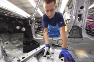 On the BMW Factory Tour in Munich, you will see employees assembling cars as they pass down the assembly line