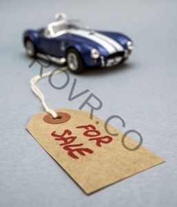 Miniature car. Vintage label with written word for sale.